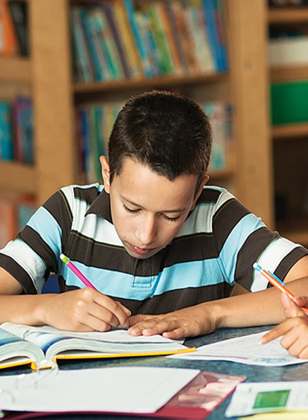 teacher helping kids with homework