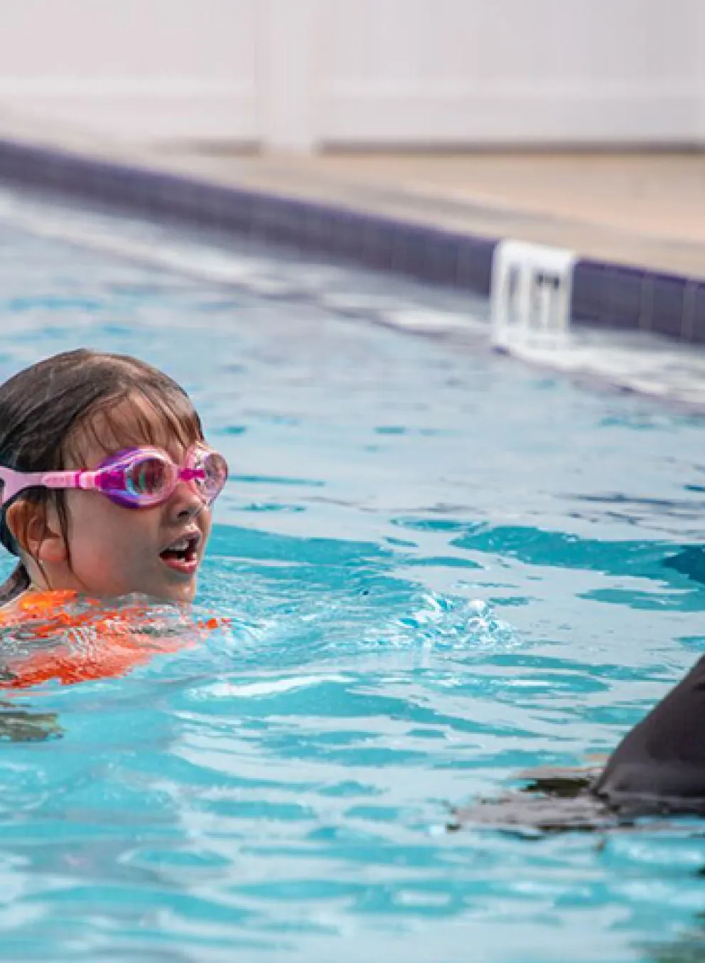 young girl taking the swim test
