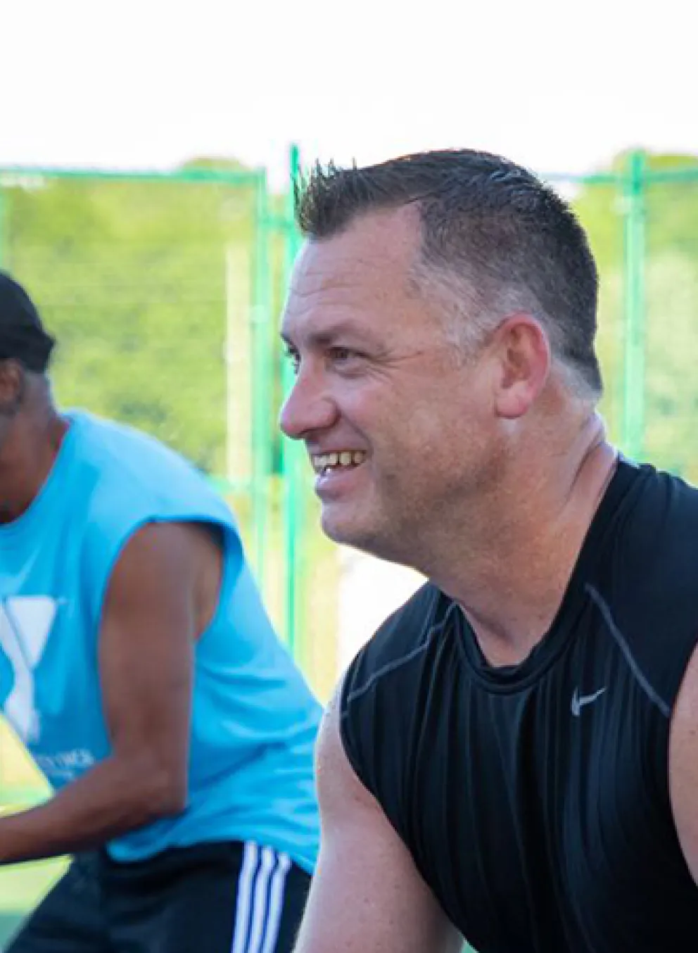 two man pickleball team waiting for service