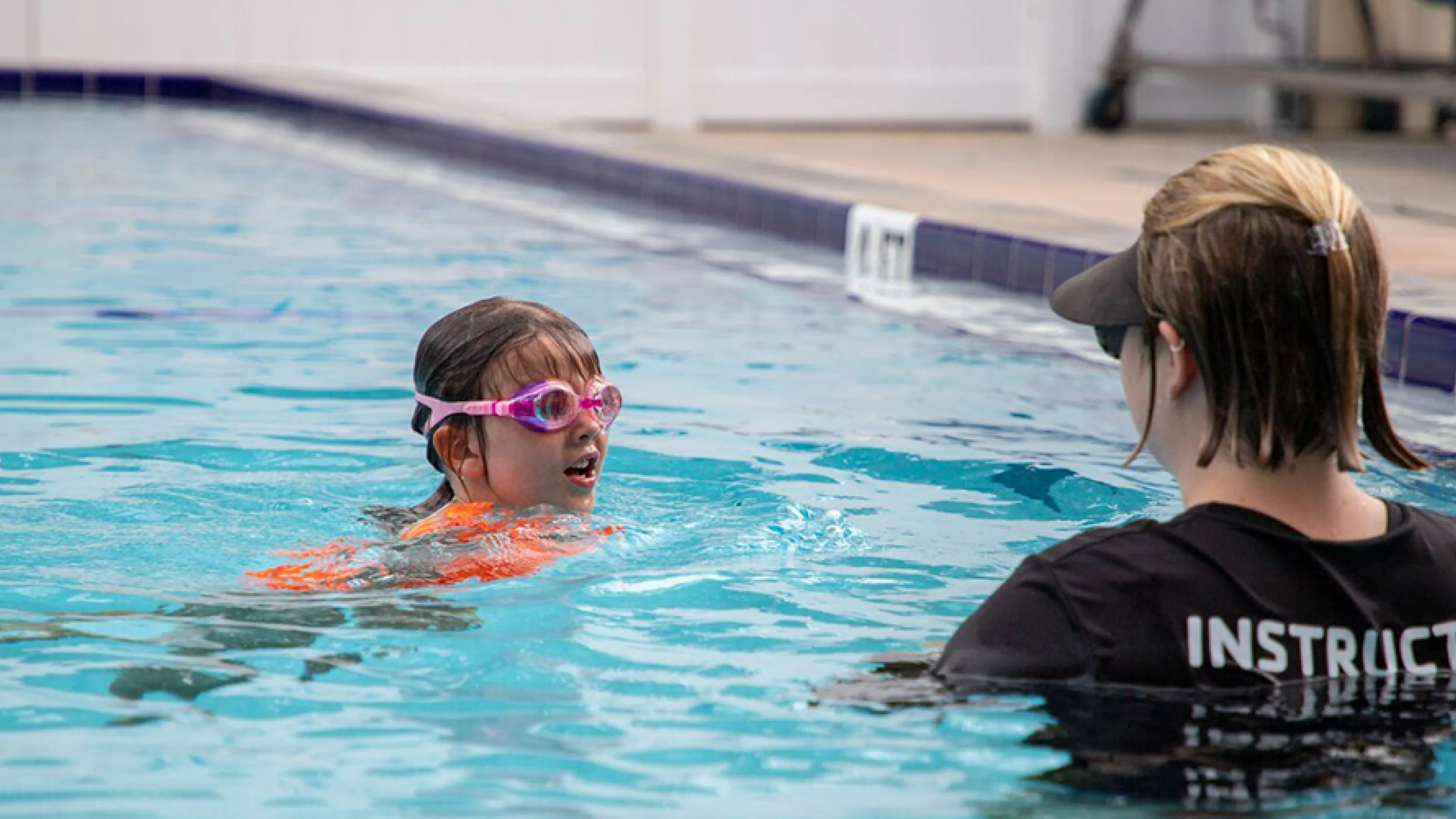 young girl taking the swim test