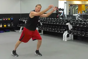 exercise instructor lunge and reach