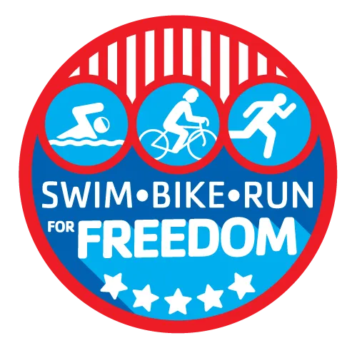 Logo for the Greater Palm Harbor Kids Triathlon 2022. Circle with red outline, bottom of circle is blue fill color and five white stars. Top of circle are white icons on light blue background, red and white lines above. Text in white reads SWIM BIKE RUN for FREEDOM.