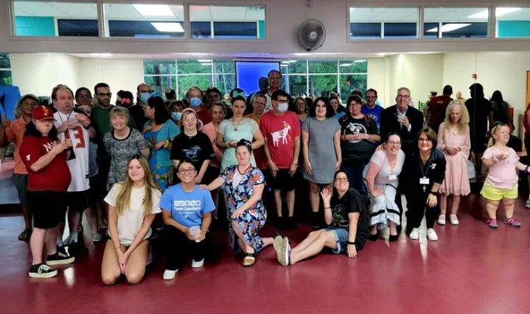 Group photo of MASH (Mainstream Adults Sharing Hope) members at the John Geigle YMCA.