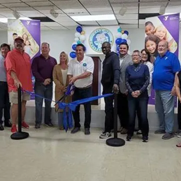 YMCA of the Suncoast staff and City of Crystal River representatives cut the ribbon at the official opening of the Crystal River YMCA Community Engagement Center.