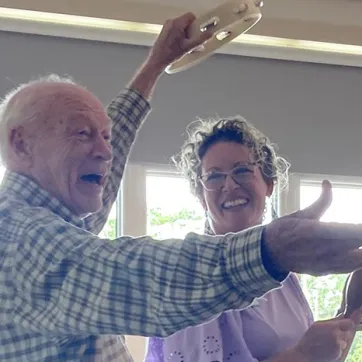 Lewis on his tambourine with Janie 