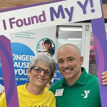 Seth Milbrand with a LiveStrong participant.