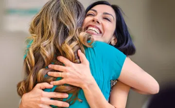 Two women embracing at the Y