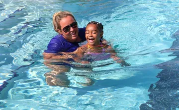Instructor and child in pool for SAW