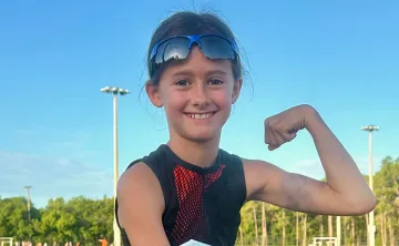 Youth participant in Kids Triathlon at the Greater Palm Harbor YMCA