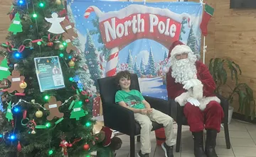 John Geigle YMCA member with Santa!